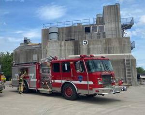 Fire engine truck in front of building